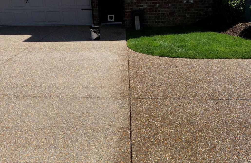 Close-up of two textured concrete slabs separated by a vertical seam, one lighter and one darker brown.