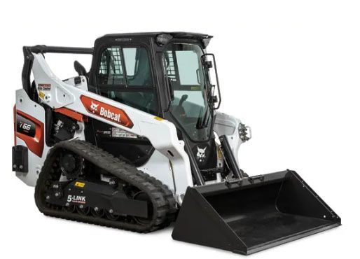 A bobcat track loader with a black bucket on a white background.