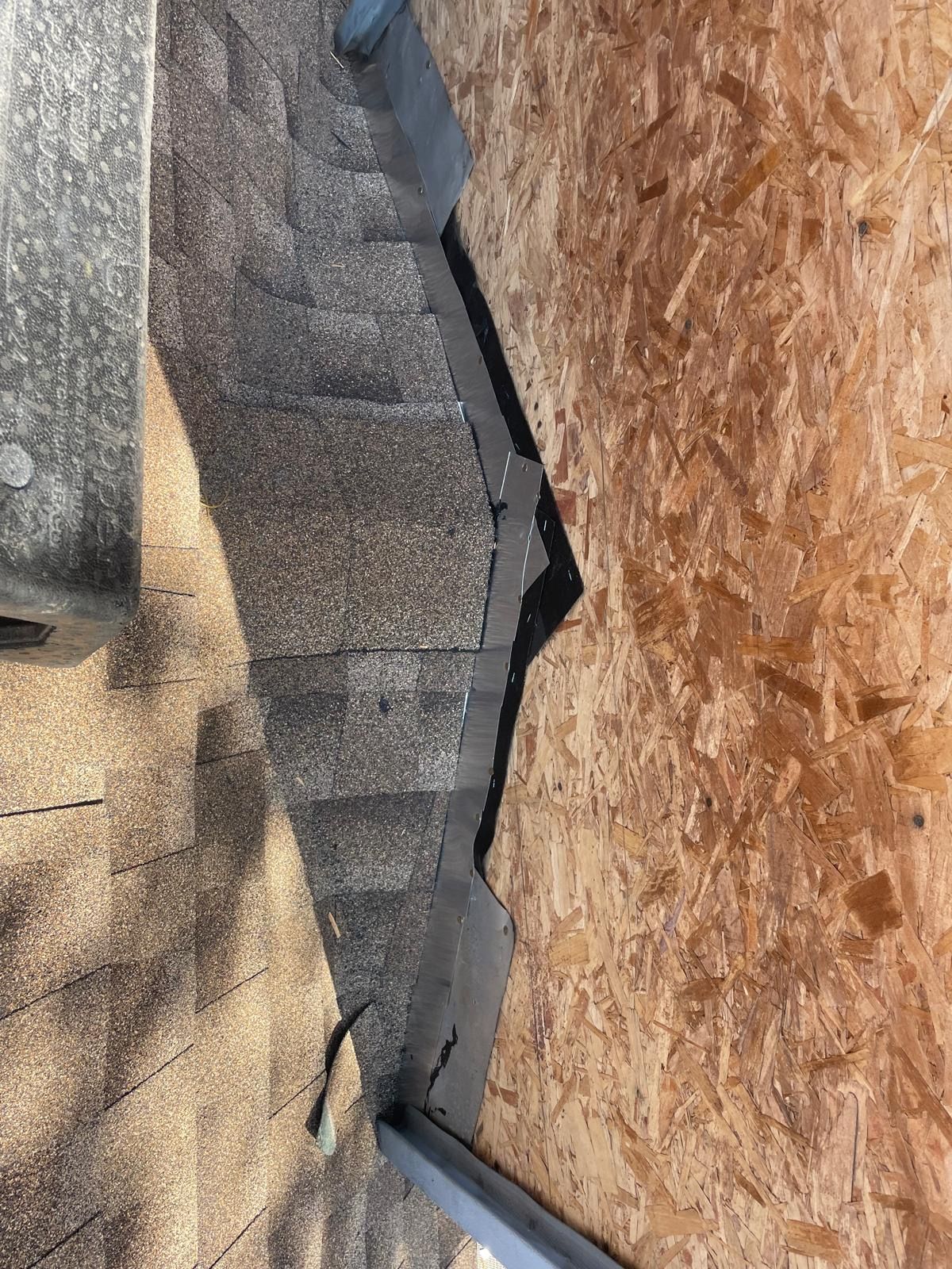 A close up of a roof with a hole in it.