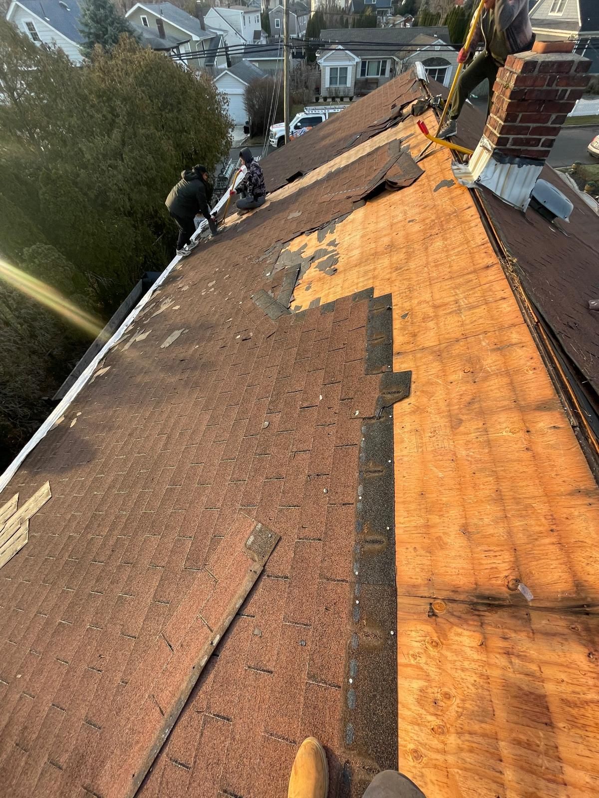 A brown dome is sitting on top of a roof.