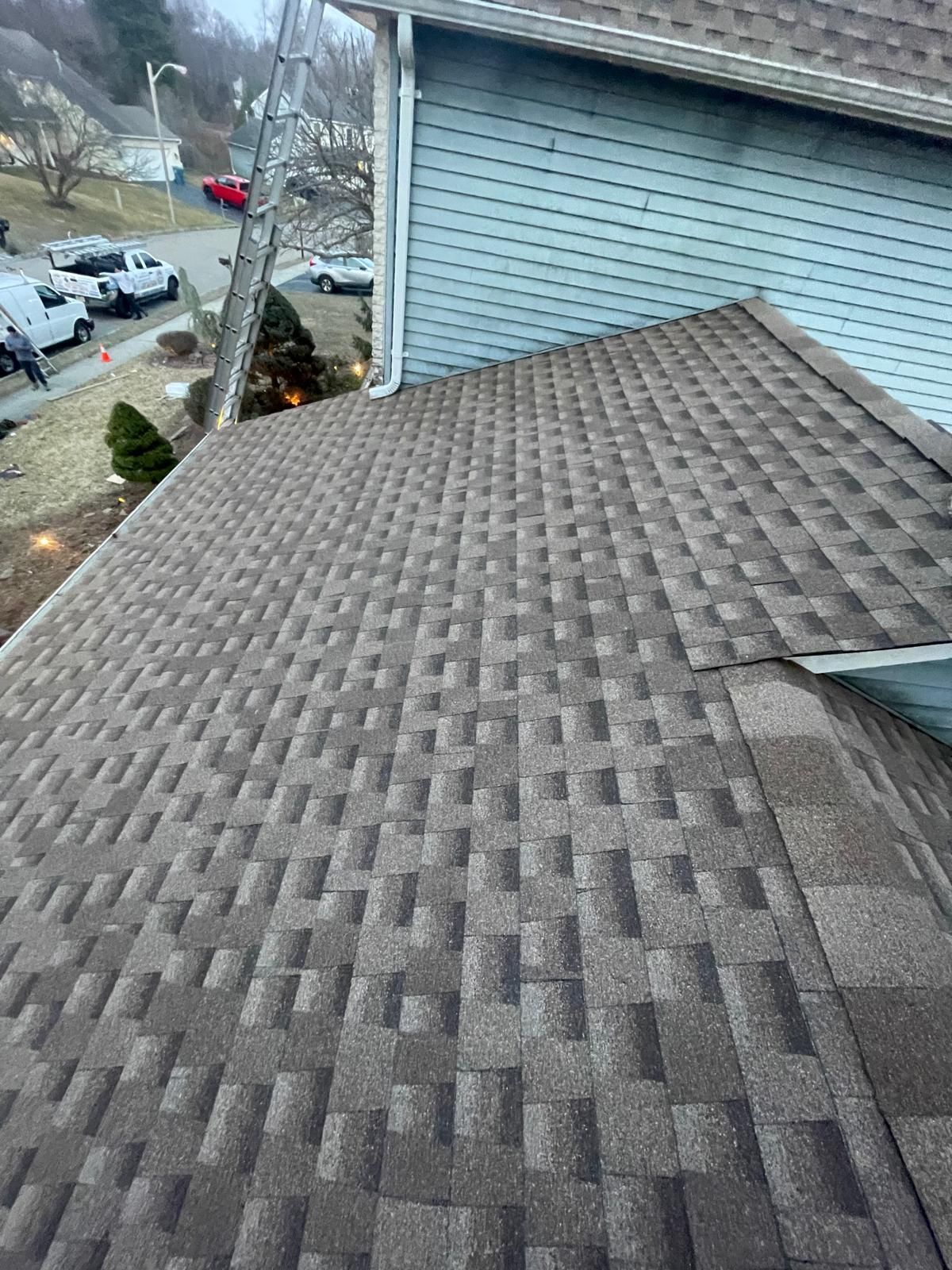 A roof of a house with a lot of shingles on it.