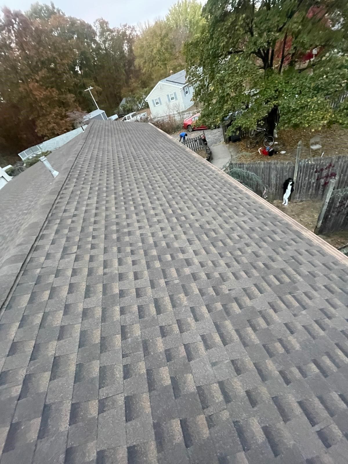 A close up of a roof with a lot of shingles on it.
