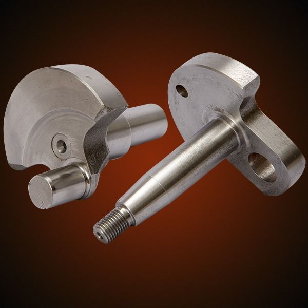 Two metallic crankshafts, one with a rod journal, the other with a threaded end and bolt holes.