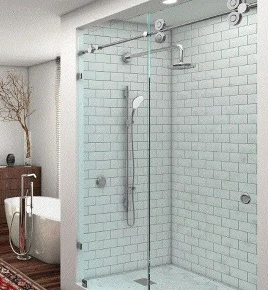 Modern bathroom with a glass shower enclosure featuring subway tile walls, a sliding door, and a freestanding tub nearby.