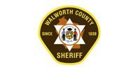 Walworth County Sheriff emblem: brown, yellow, and white star with text 