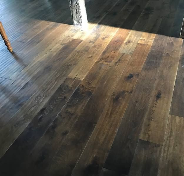 Dark stained hardwood floors.