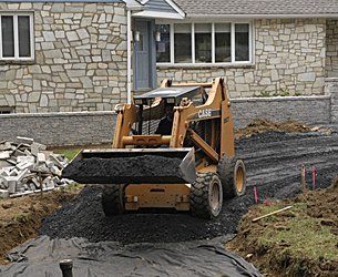 Excavating driveways