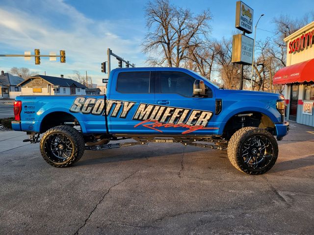 Blue lifted pickup truck with 
