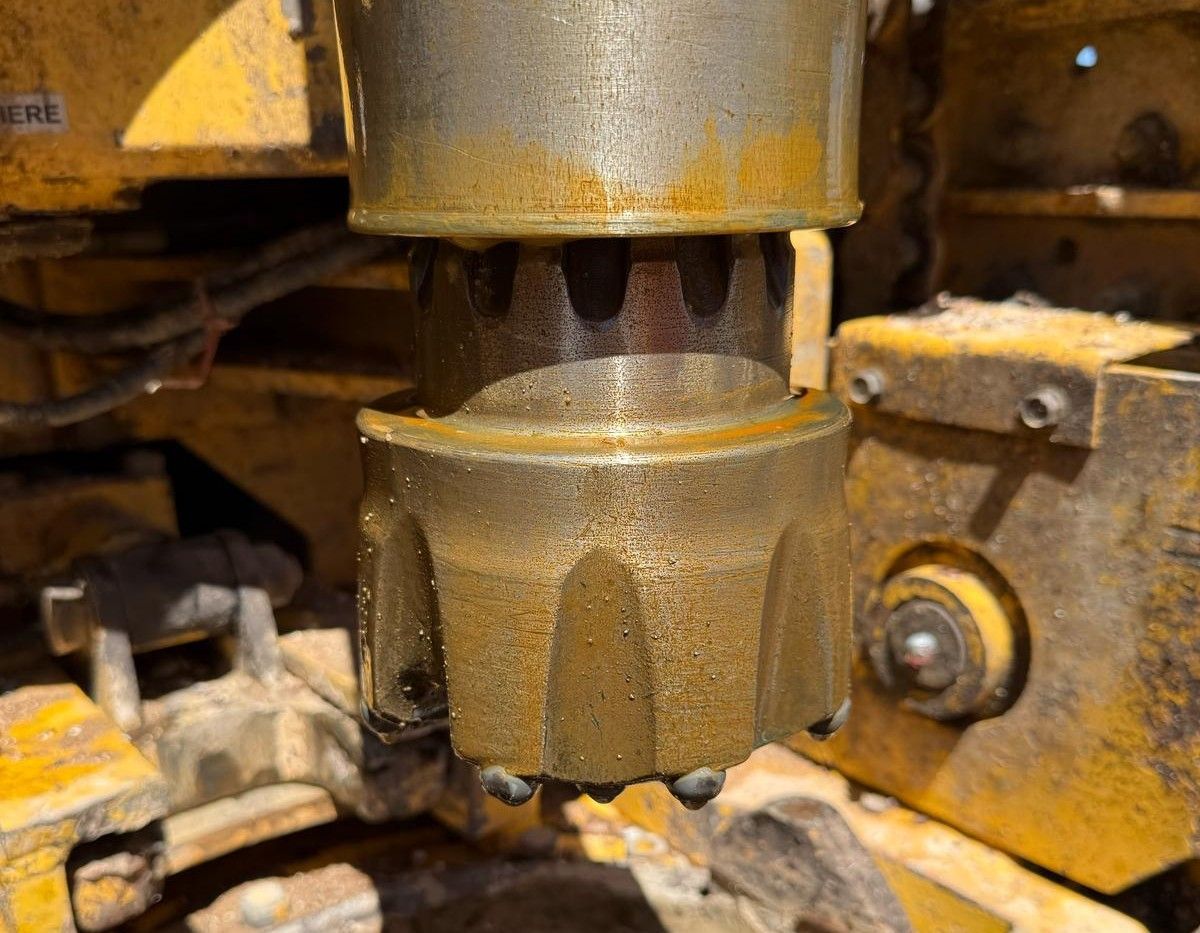A close up of a piece of metal on a machine.
