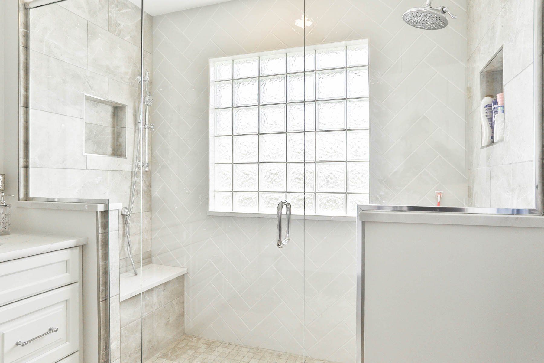 Shower with glass enclosure