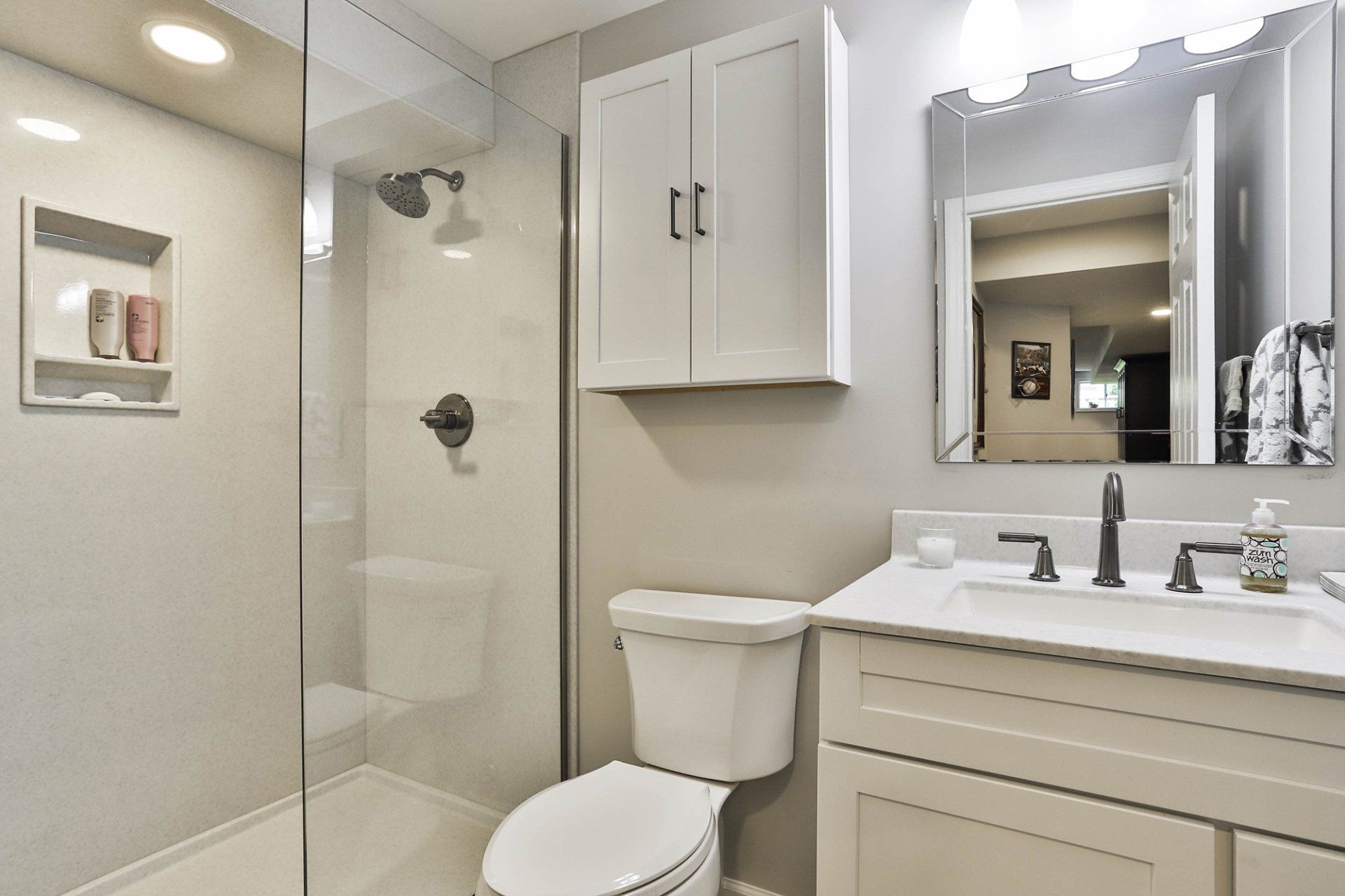 Bathroom shower and a toilet