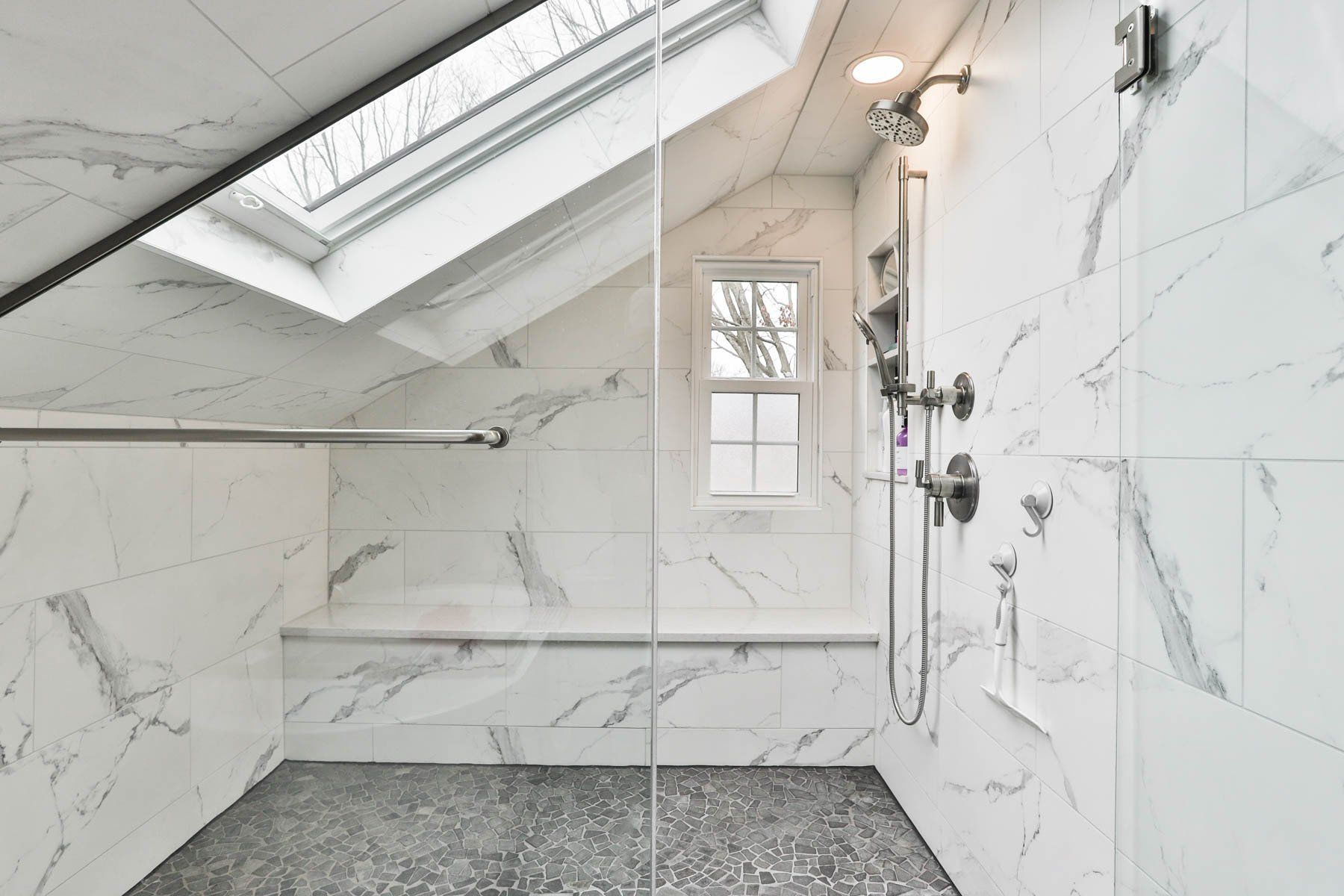 Shower with glass enclosure