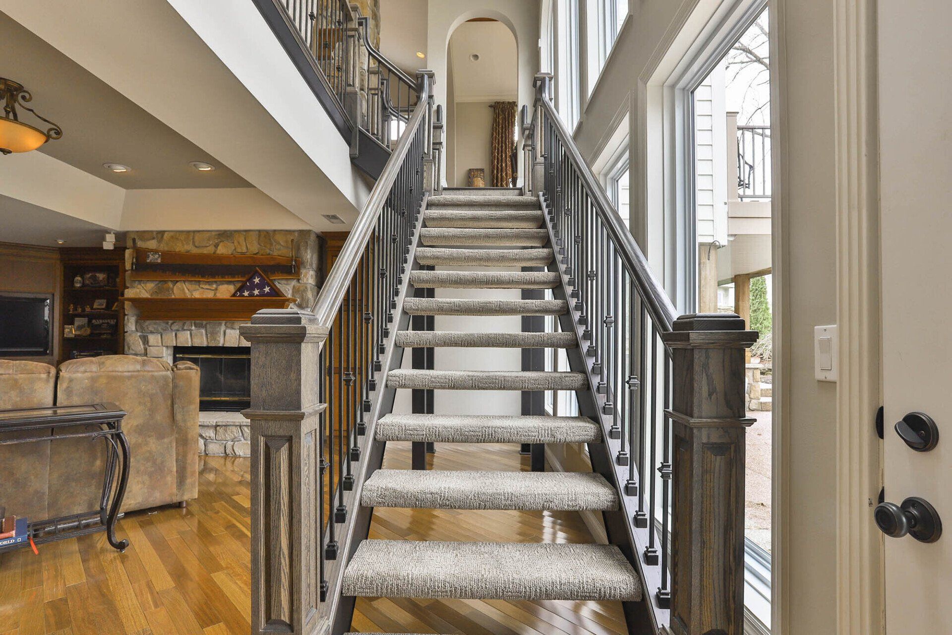 Custom stairs with beautiful wood railing