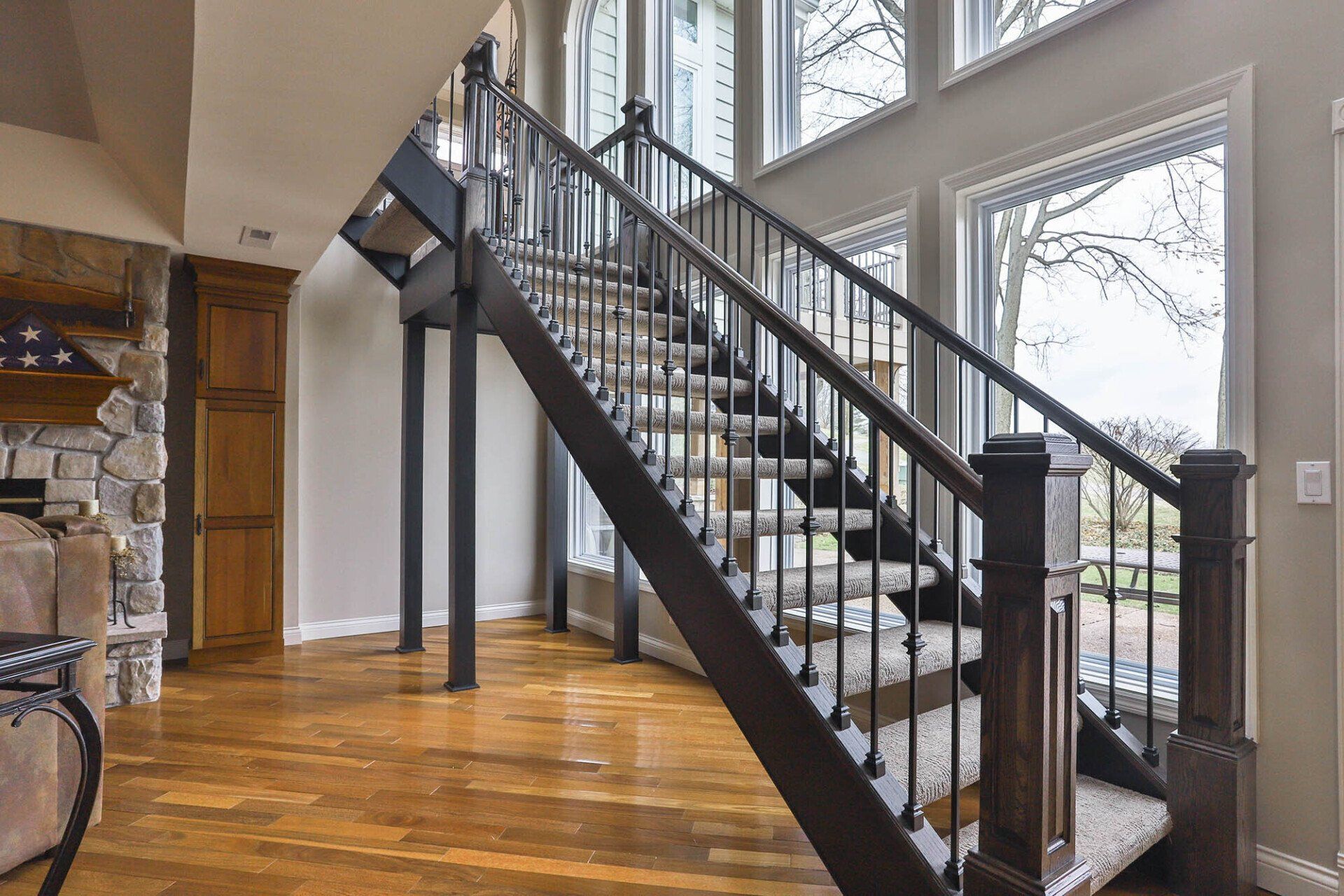 Custom stairs with beautiful wood railing