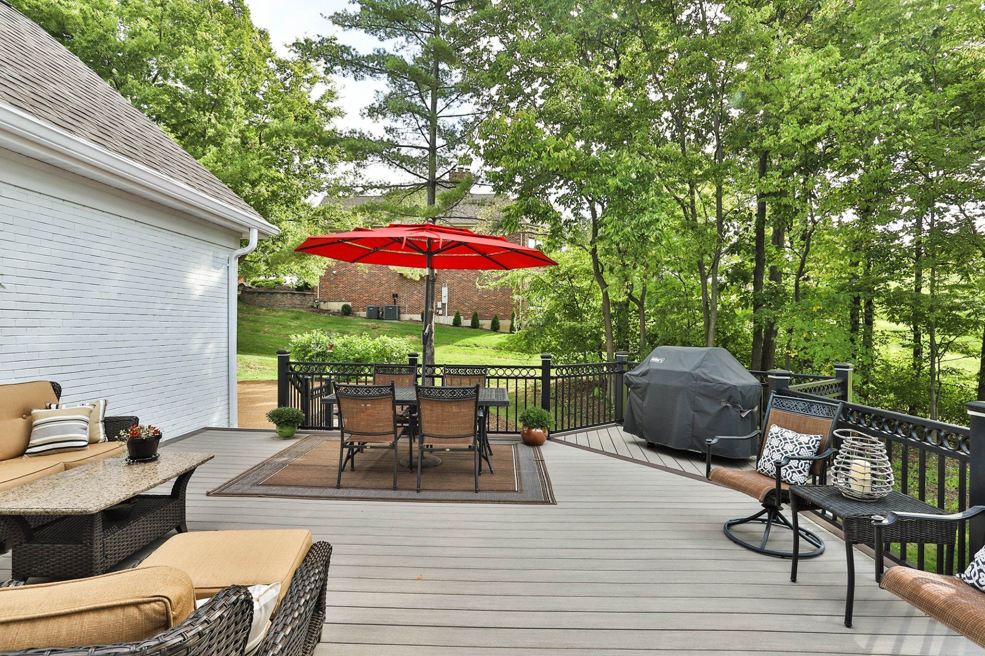 Beautiful deck design with an outdoor table set