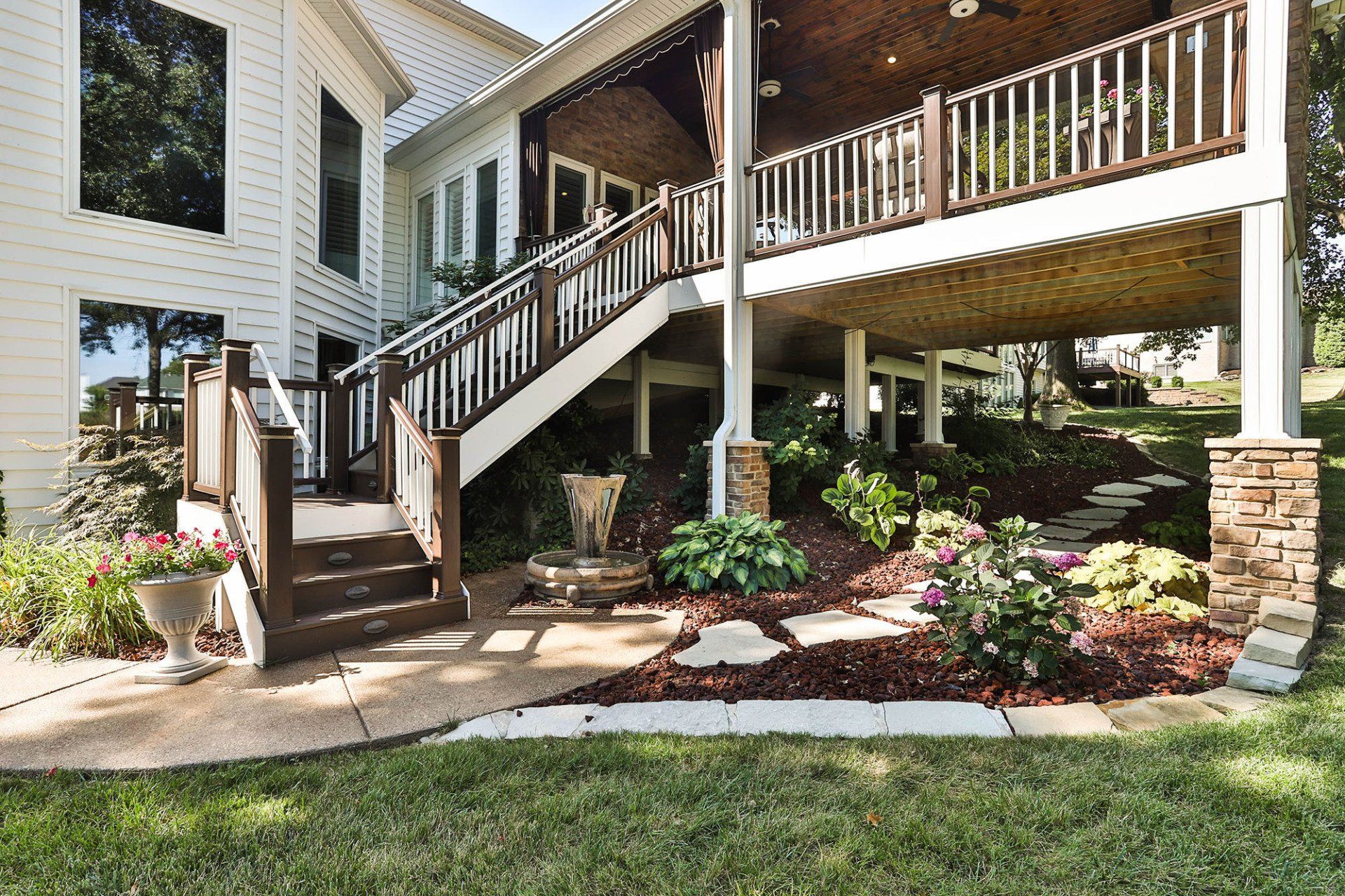 Backyard deck with a mini garden below