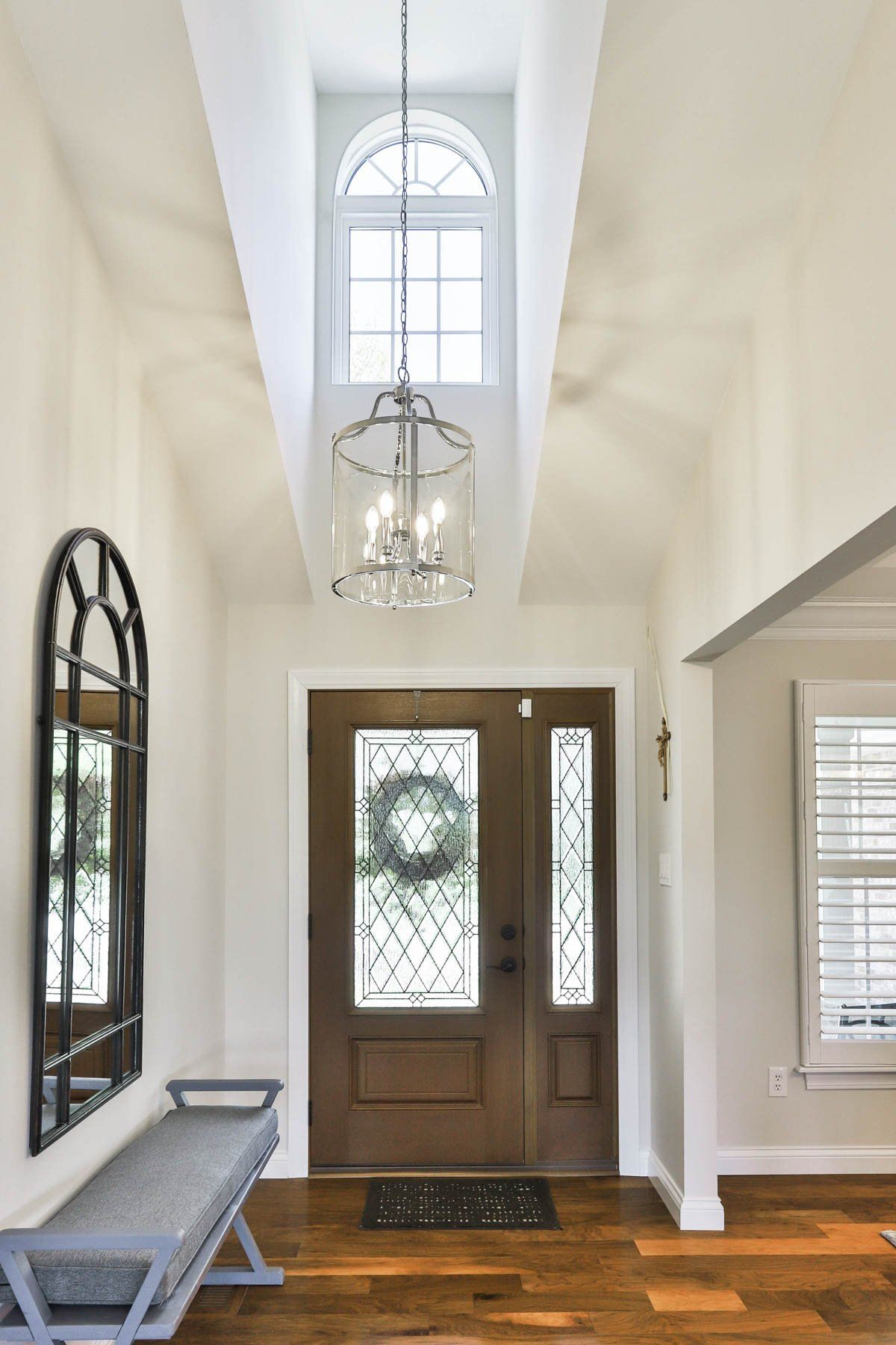 Residential wood and glass front door viewed from inside the house