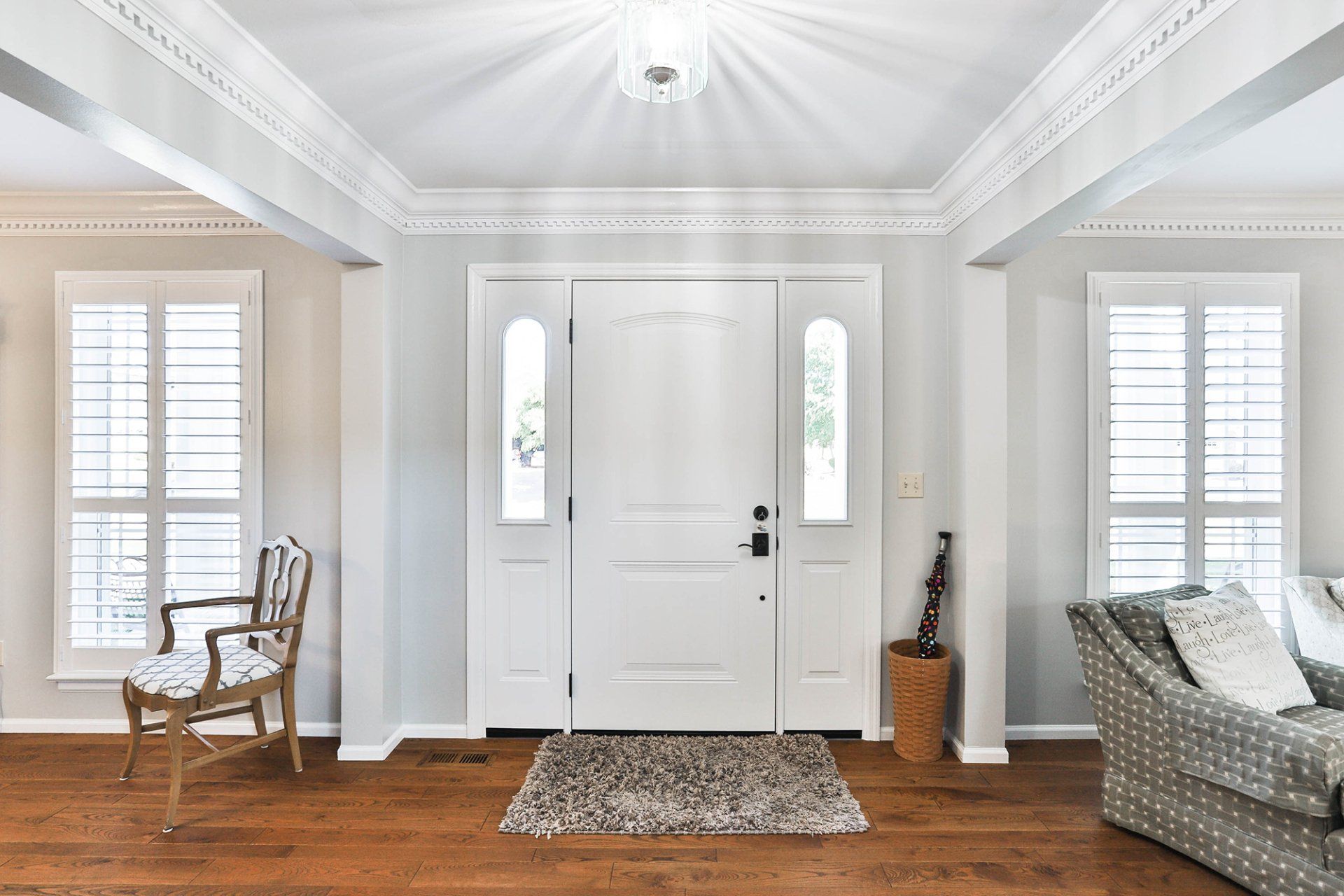 White front door viewed from inside the house