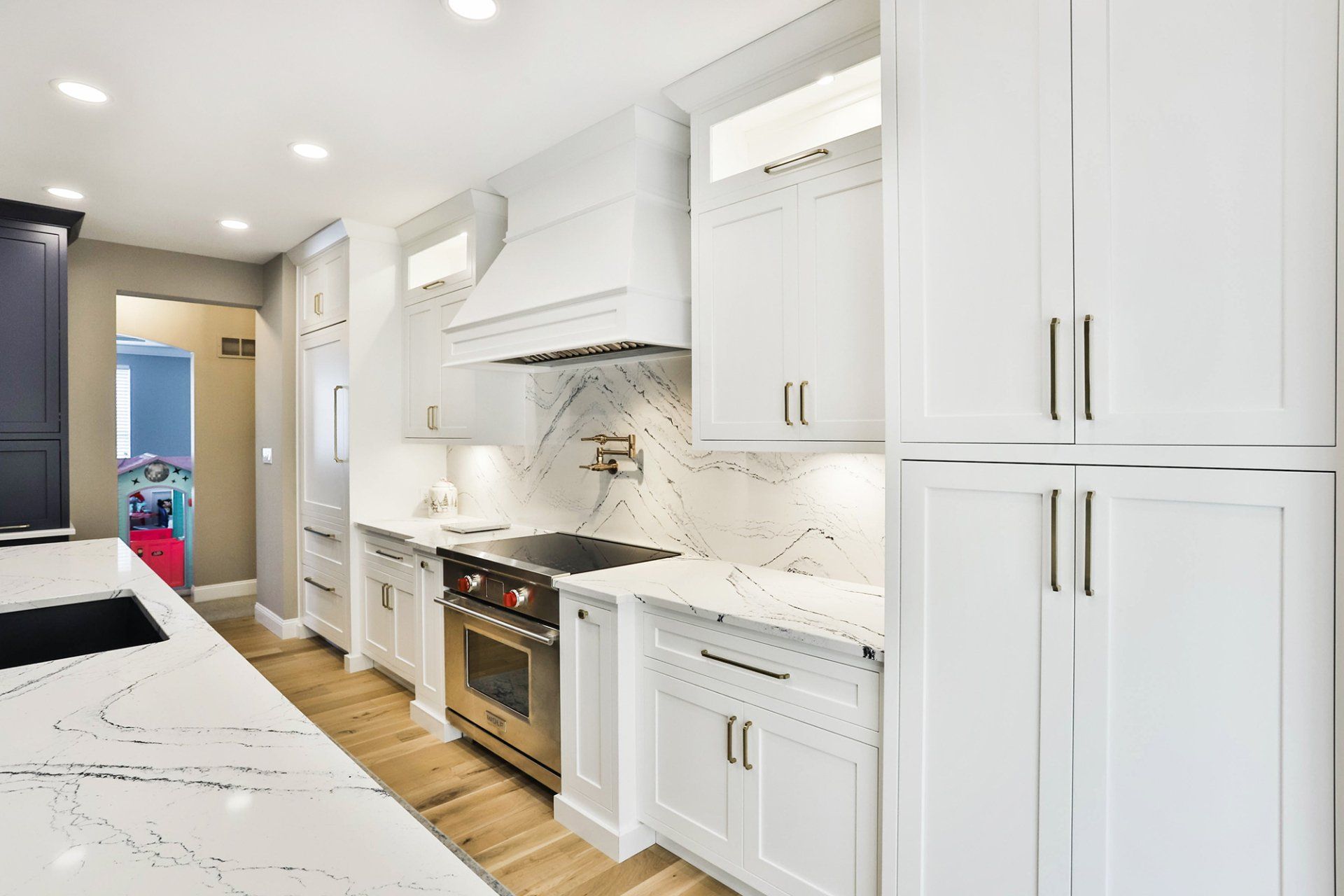 White kitchen cabinets with appliances