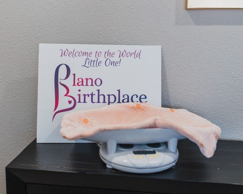 A sign that says welcome to the world little one