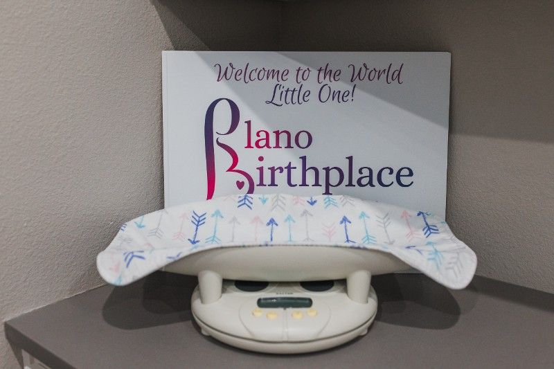 A sign that says welcome to the world little one
