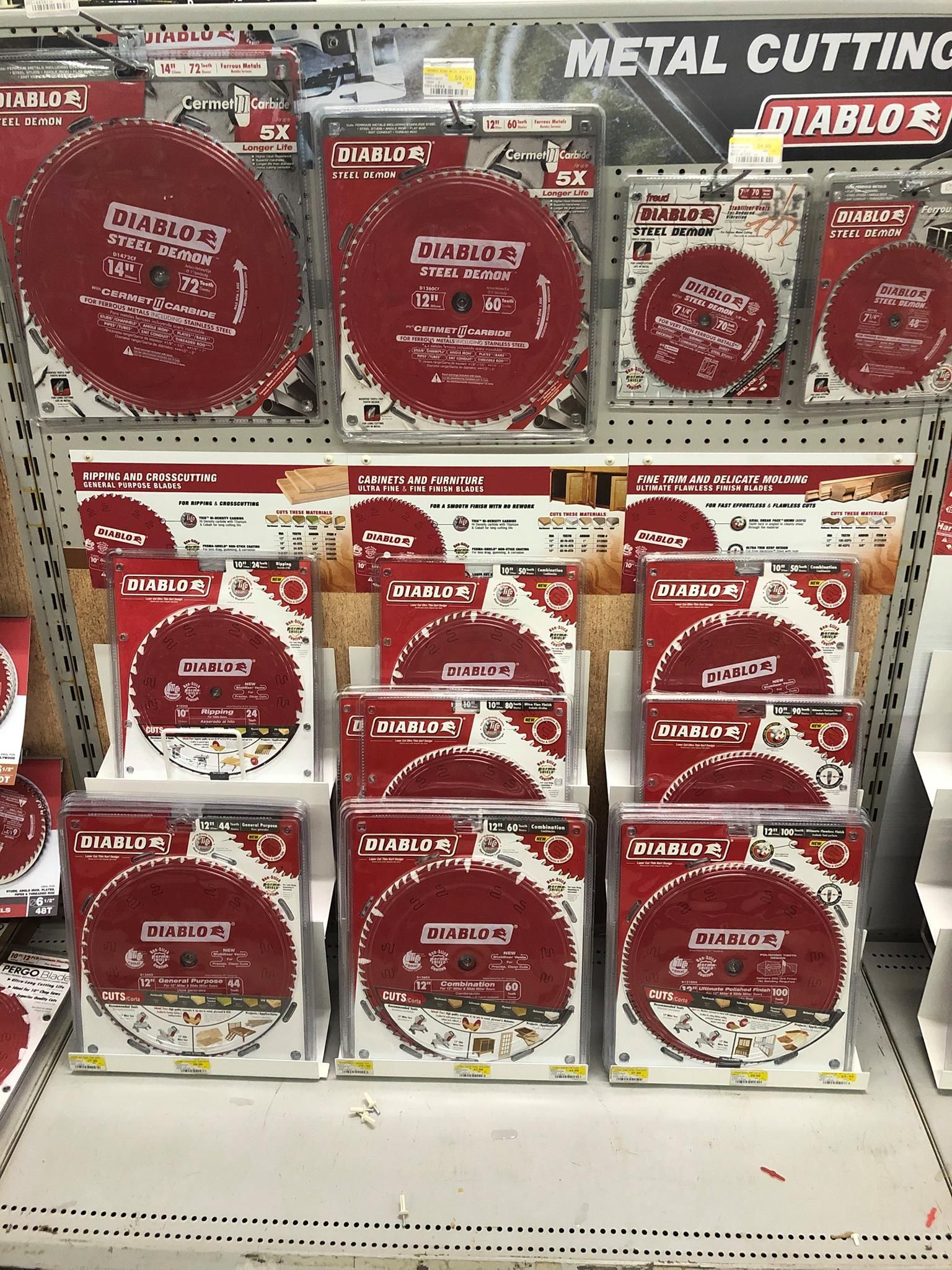 A display of metal cutting blades in a store