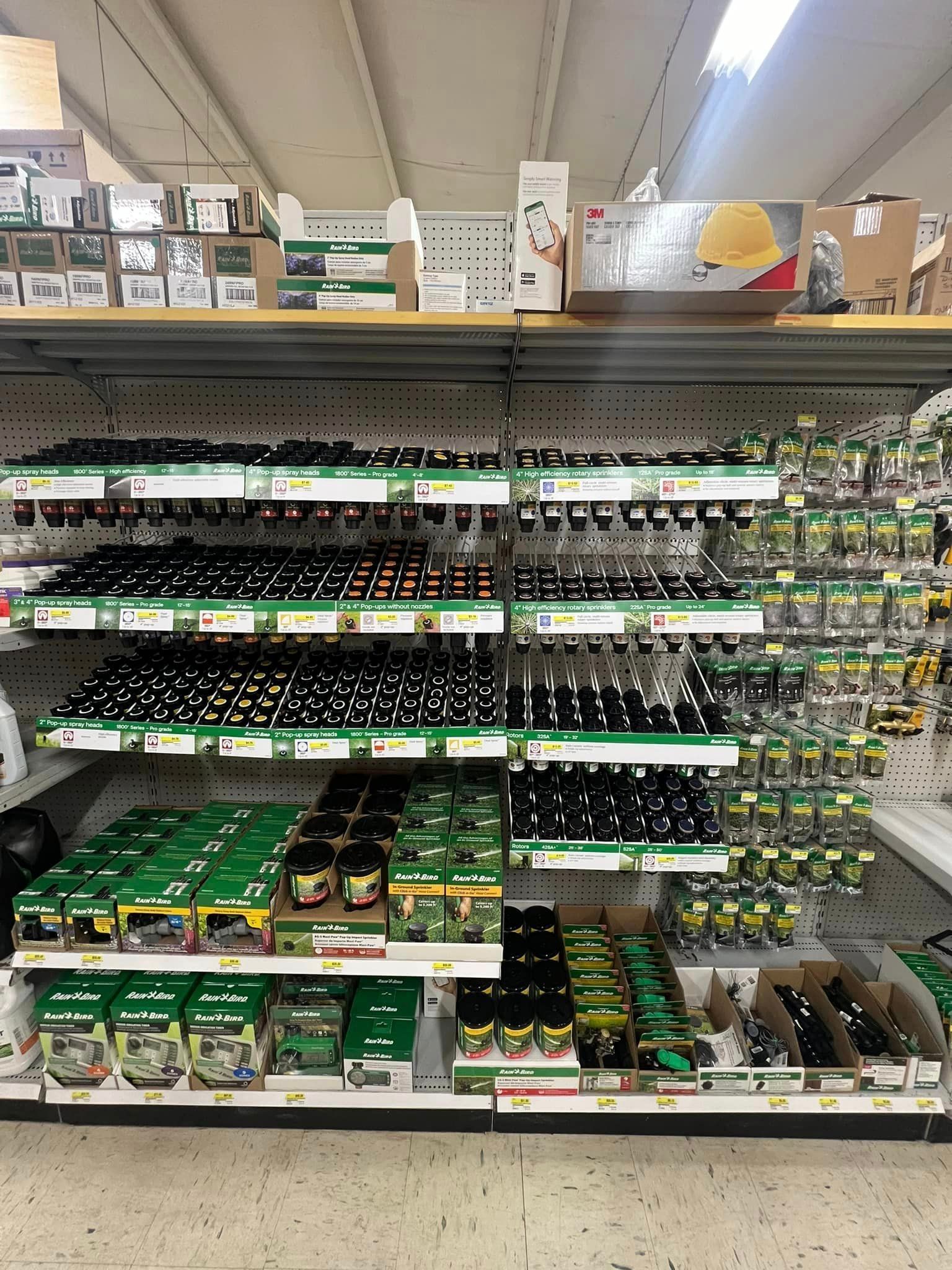 A shelf in a store filled with lots of products.