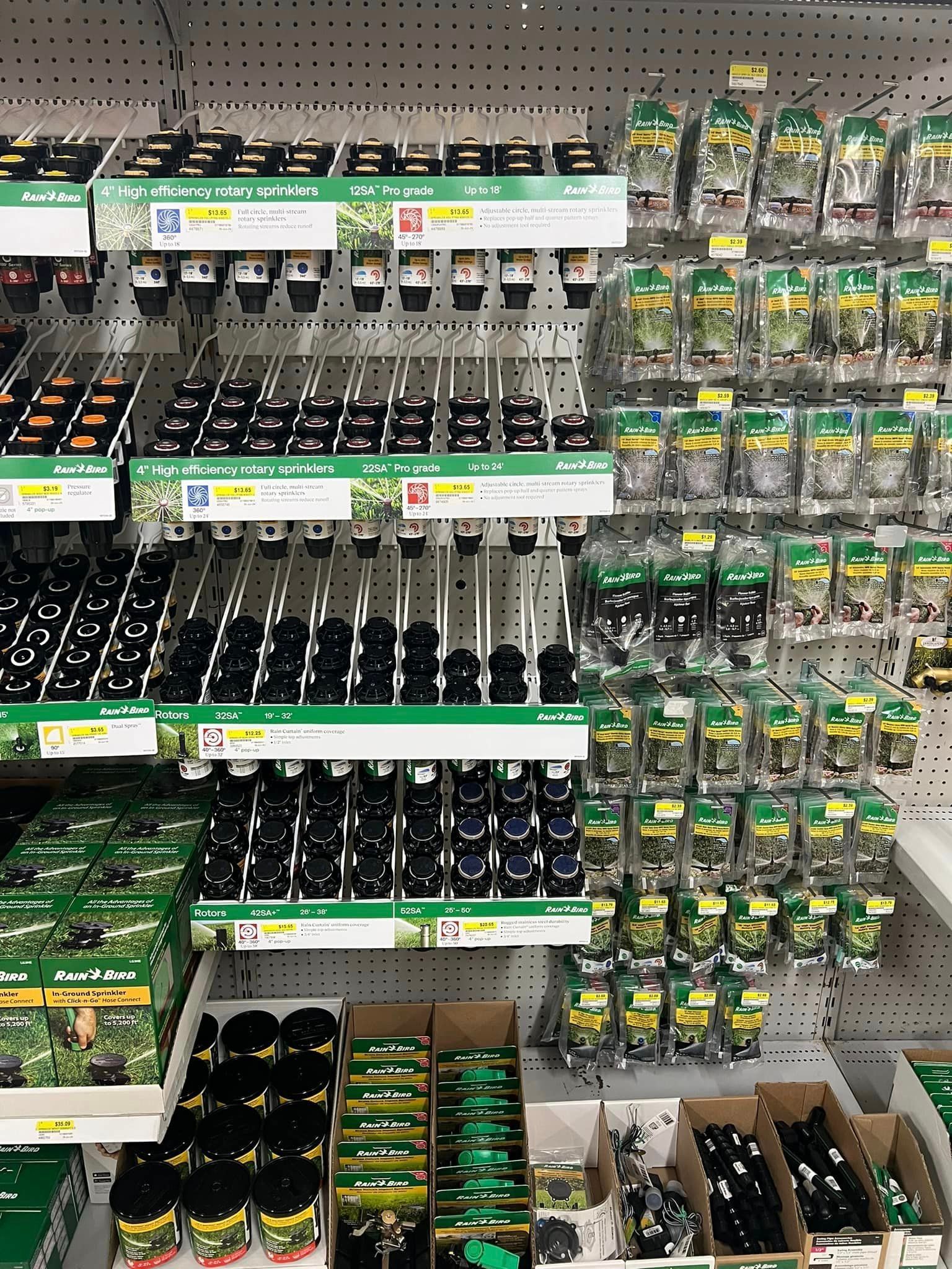 A shelf in a store filled with lots of different items.