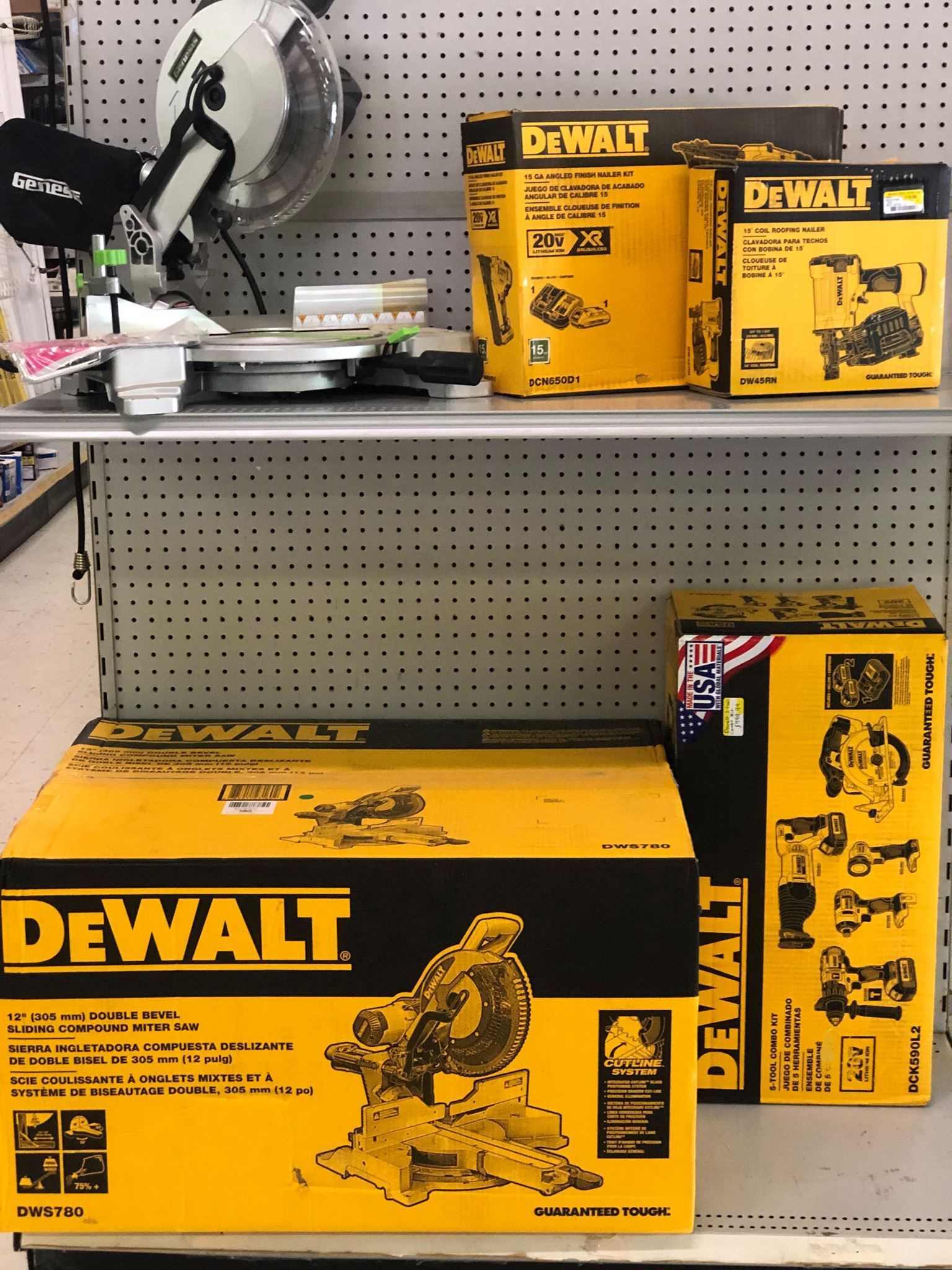 Boxes of dewalt tools are on a shelf in a store