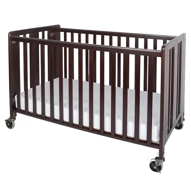 Dark brown folding crib with a white mattress, on wheels.