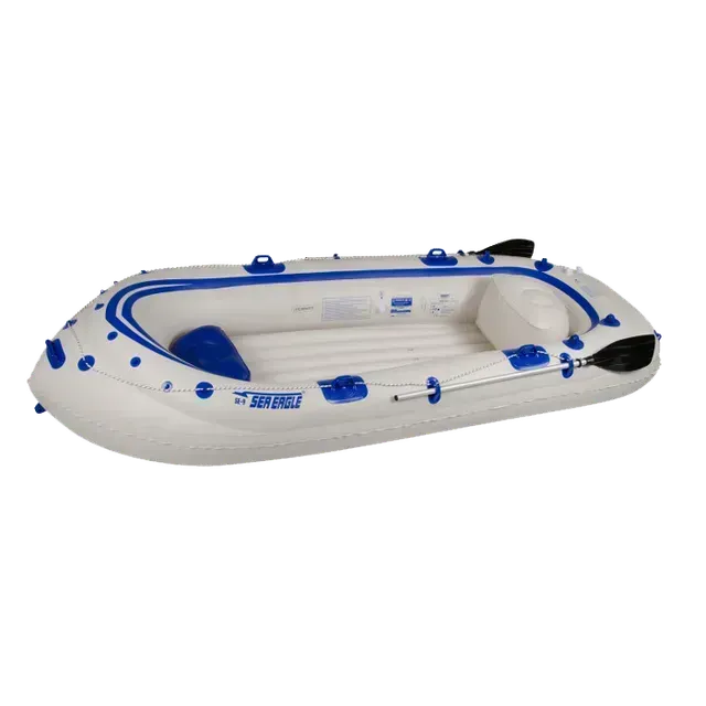 White and blue inflatable boat, with oars, on a white background.