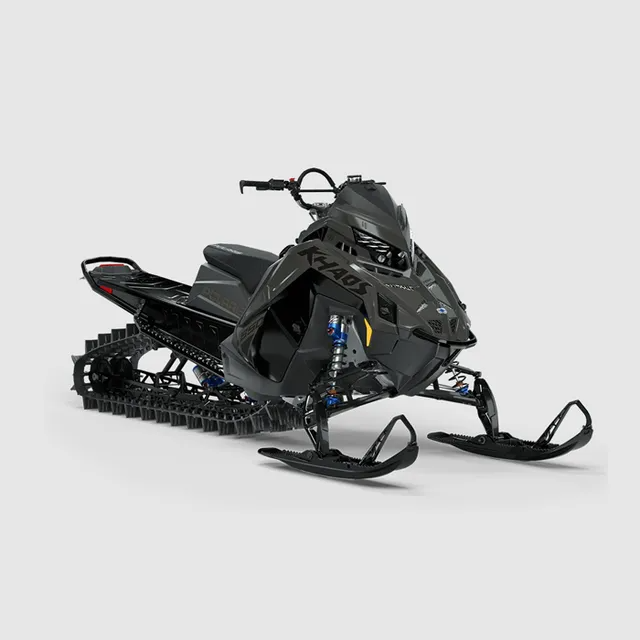 Black snowmobile on a white background, angled front view. It has skis, track, handlebars, and blue shocks.