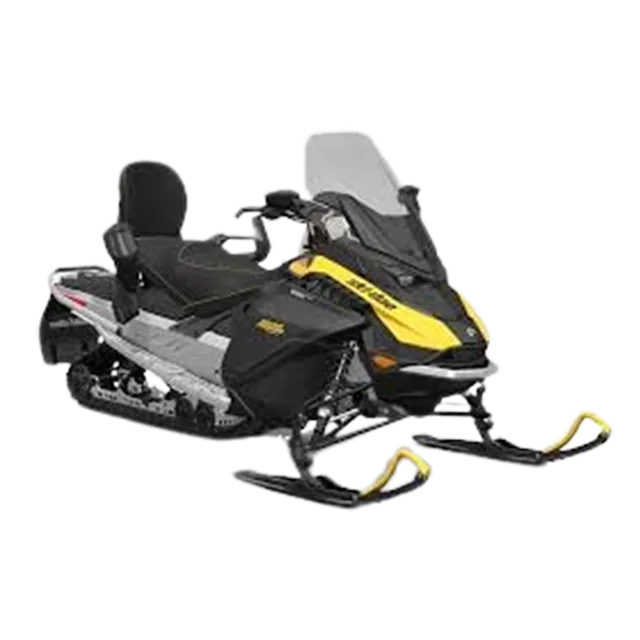 Yellow and black Ski-Doo snowmobile with a passenger seat, windshield, and black saddlebags on snow.