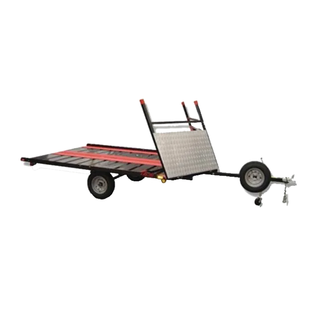 Red and black utility trailer with aluminum ramp, black wheels, and hitch.