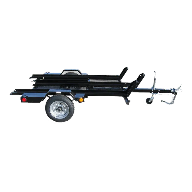 Black motorcycle trailer with two wheel tracks, a single wheel, and a hitch.