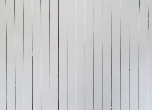 White vertical wooden planks.