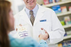 Pharmacist Assisting Customer