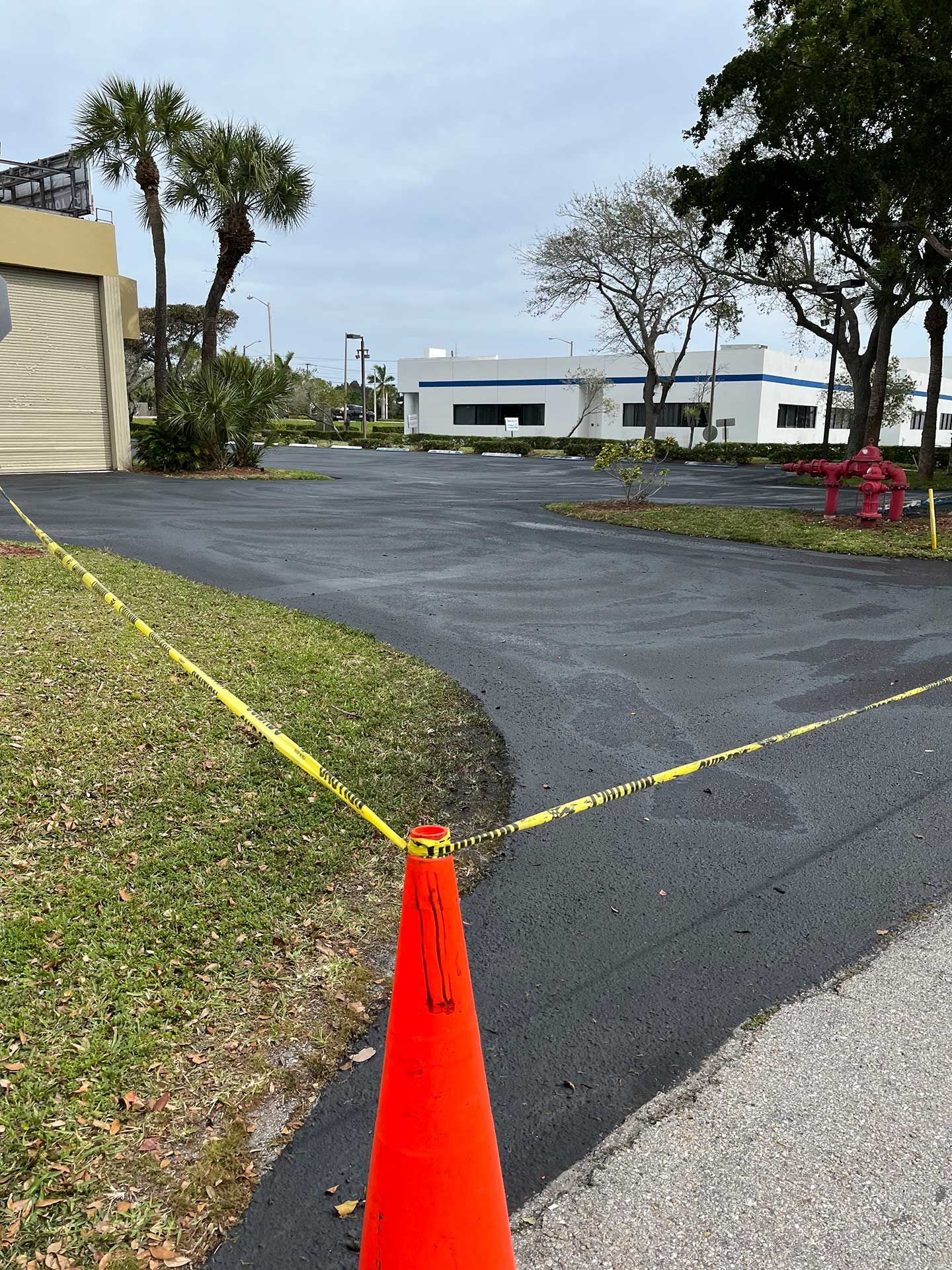 a yellow caution tape around the parking lot