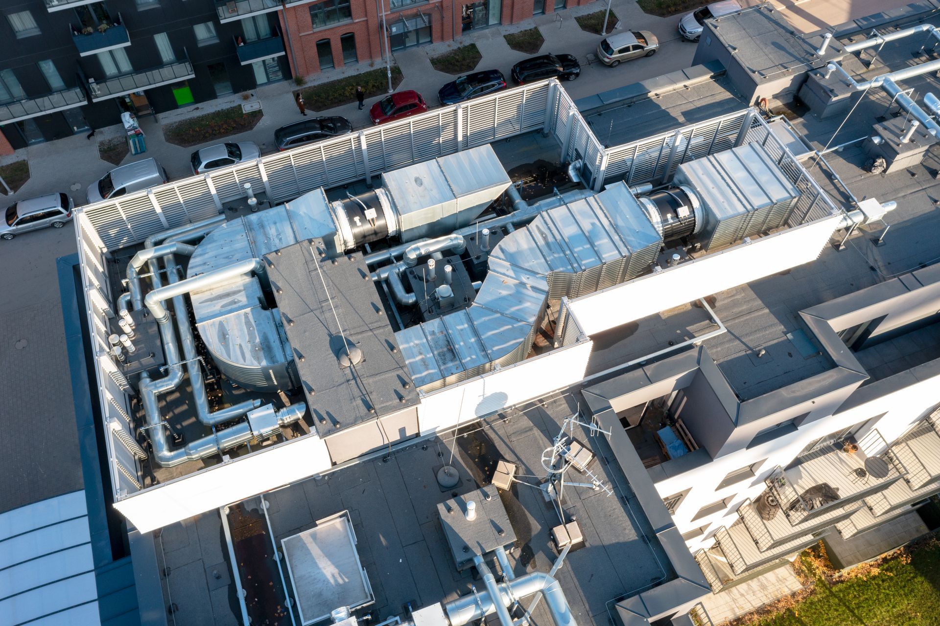 An aerial view of a large commercial hvac unit on the roof of a building.