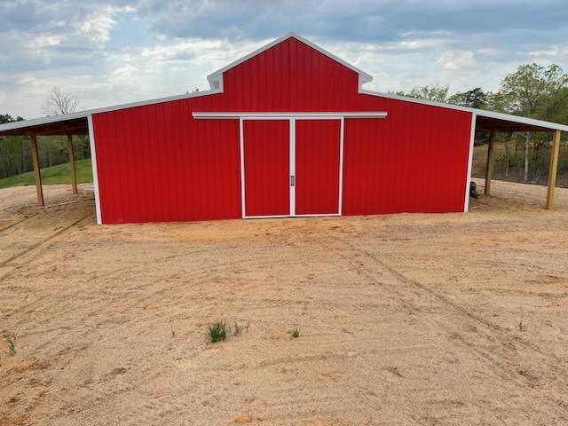 Close-up of custom metal barn doors with precision trim and hardware.
