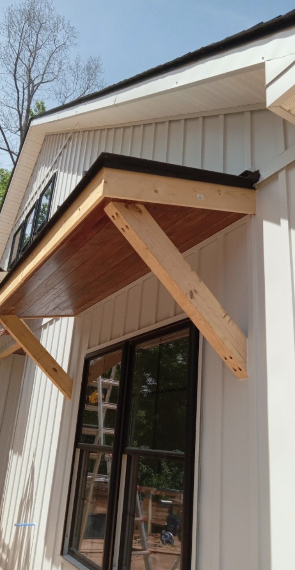 A row of garage doors are lined up next to each other.