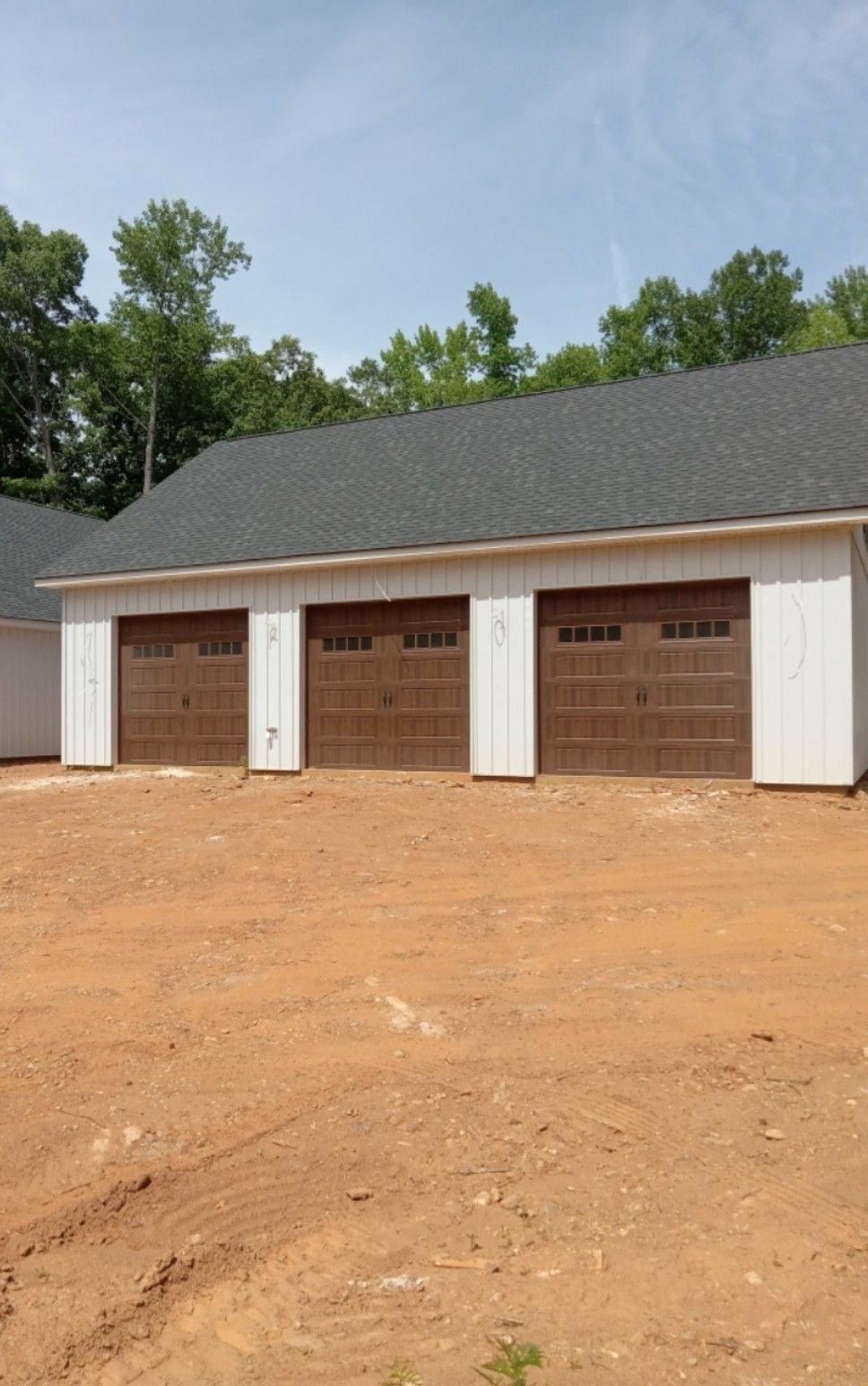 A row of garage doors are lined up next to each other.