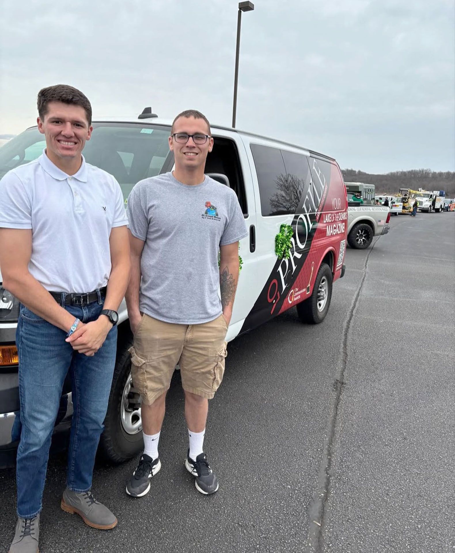 A man standing behind a table
