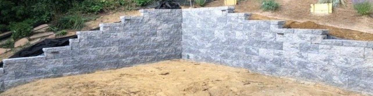 Stone retaining walls built into a hillside.