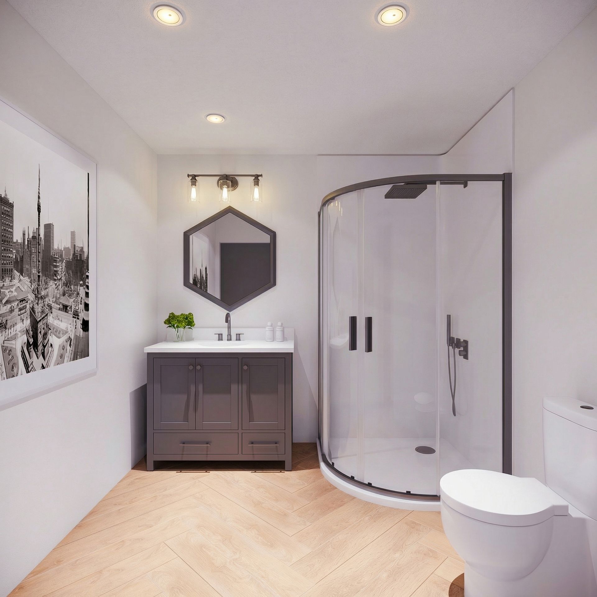 Modern bathroom with white walls, gray vanity, round shower enclosure, toilet, and black-and-white wall art.
