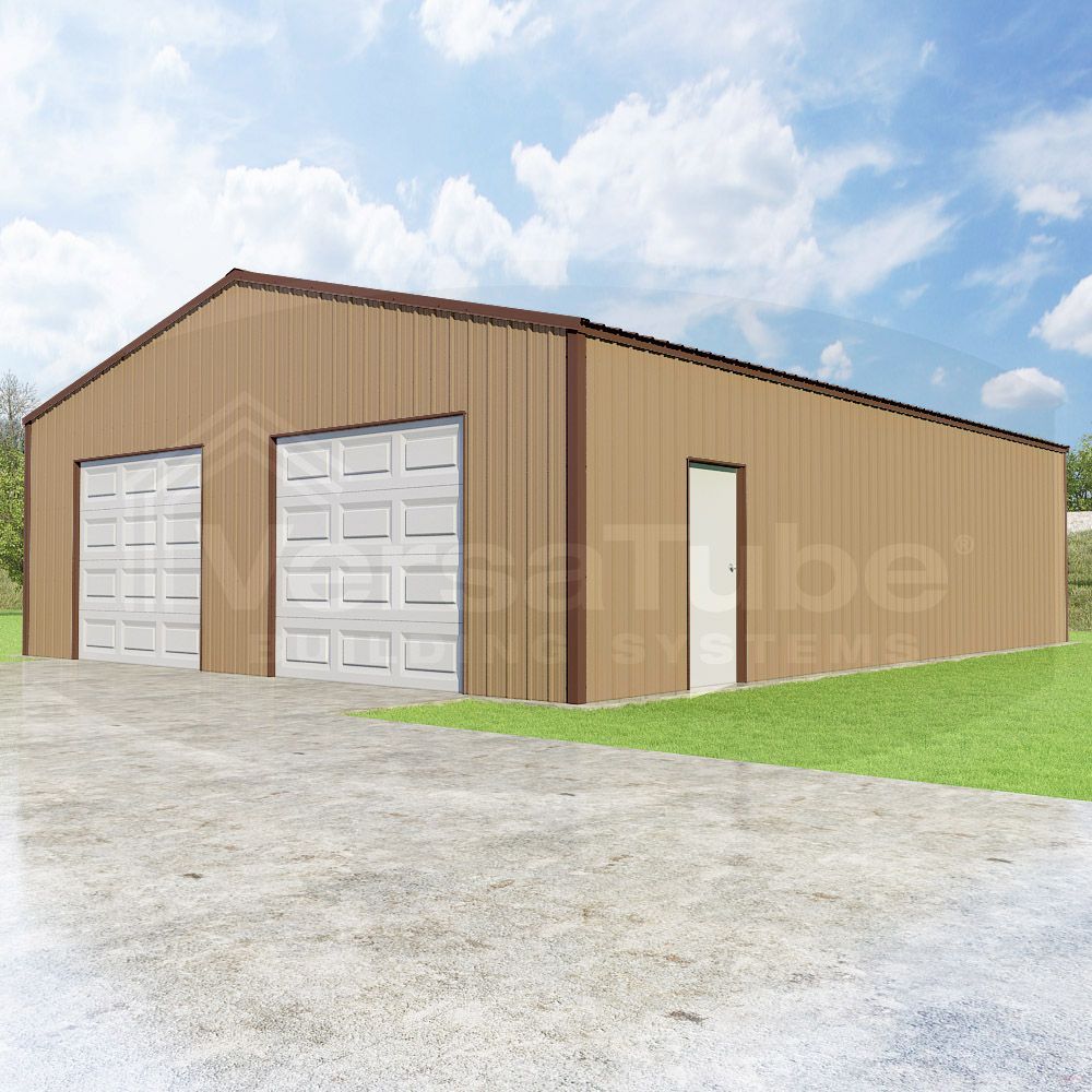 Tan metal garage building with two white overhead doors, side door, and a gravel drive under a partly cloudy sky