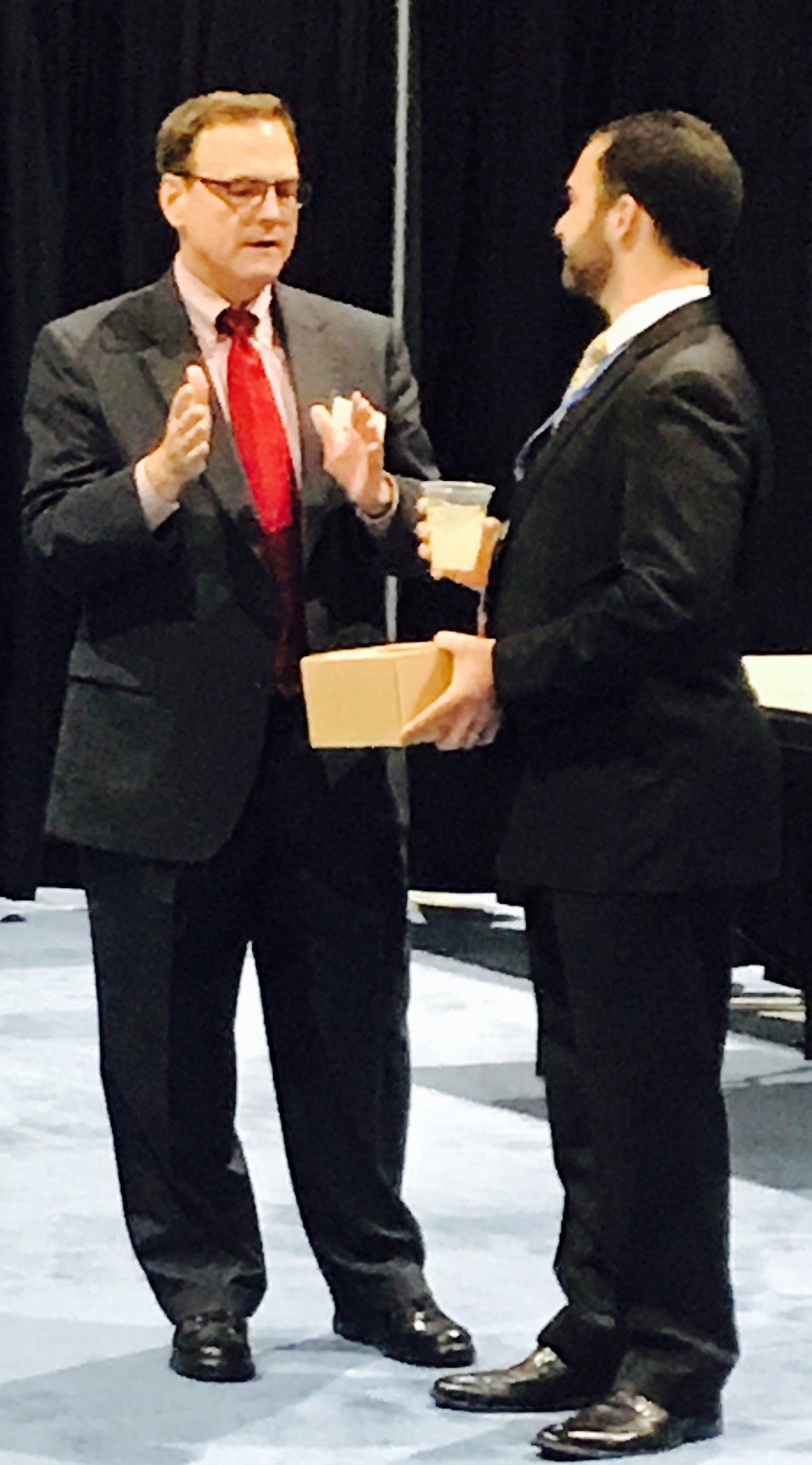 Roger speaking to an audience