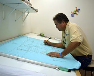 Man drawing a plan