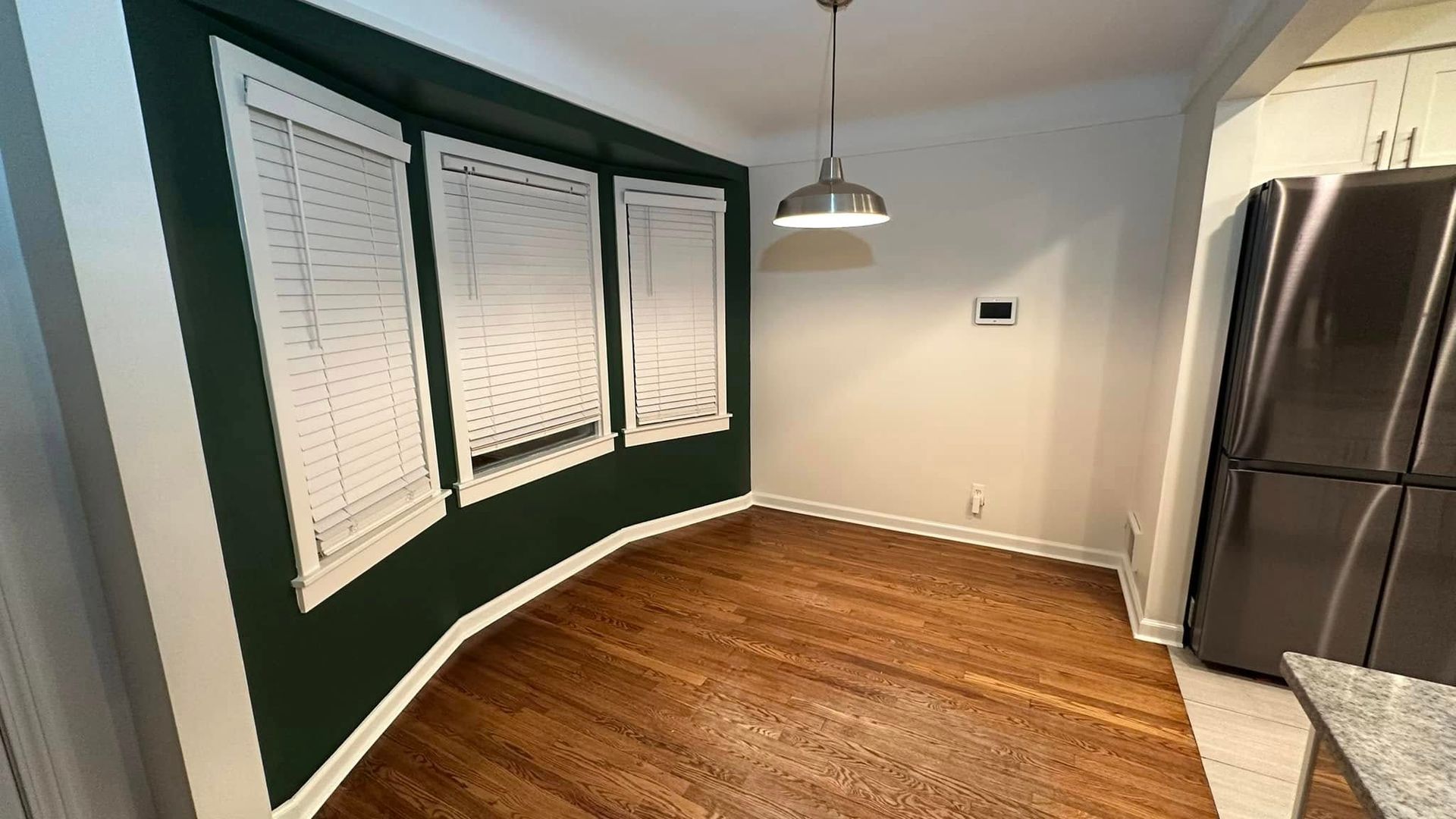 Painted accent wall in dining room in West Des Moines, Iowa.