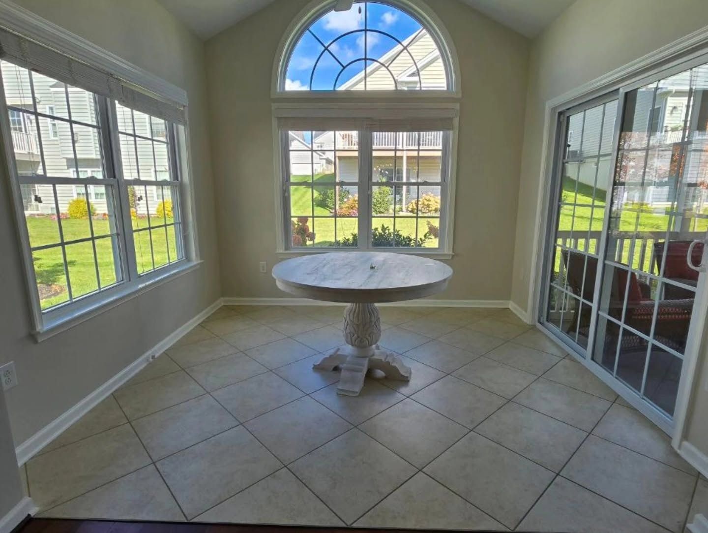 Painted interior sunroom white in Johnston, Iowa. 